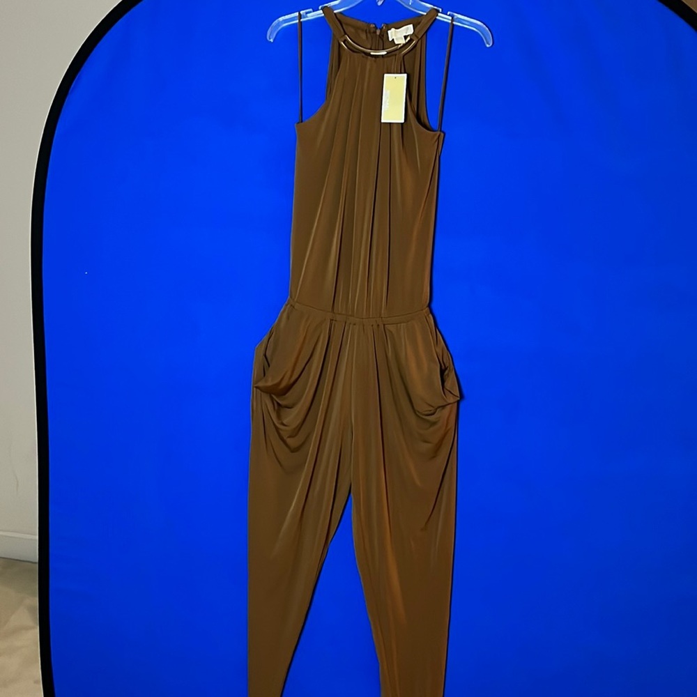 Michael Kors jumpsuit size small.  Never worn.